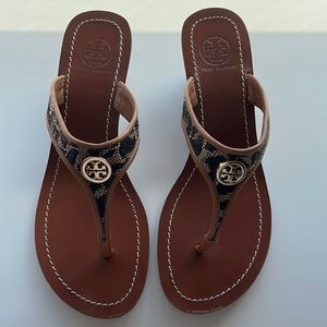 Like new Tory Burch low wedge with snake skin design. Size 7